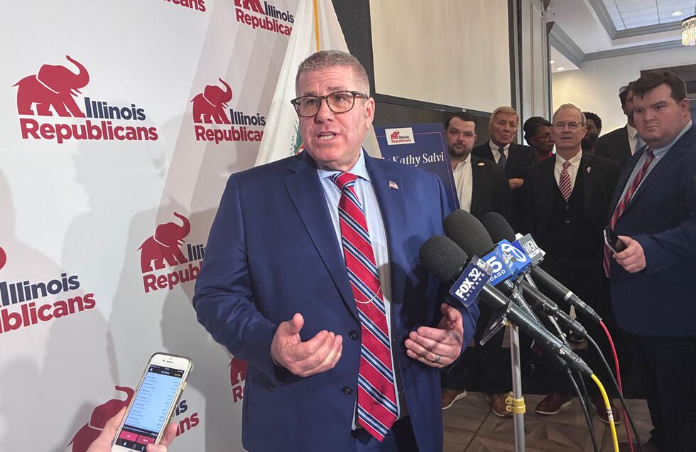 Republican nominee for governor Darren Bailey speaks to reporters following
a Republican Party...