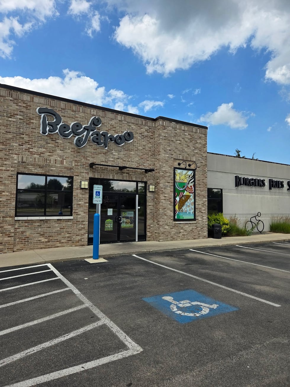 Despite signage saying the drive-thru was open, no cars were seen in the parking lot July 2 at...